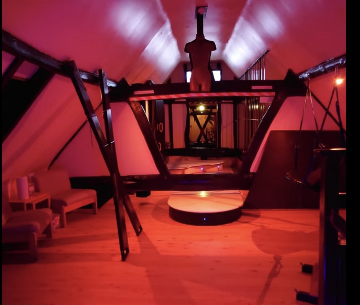 Upstairs play area bathed in deep red light